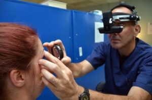 Doctor examining a patient’s eye