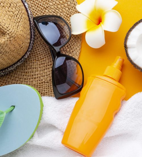 travel-items-yellow-background-top-view travel-items-yellow-background-top-view